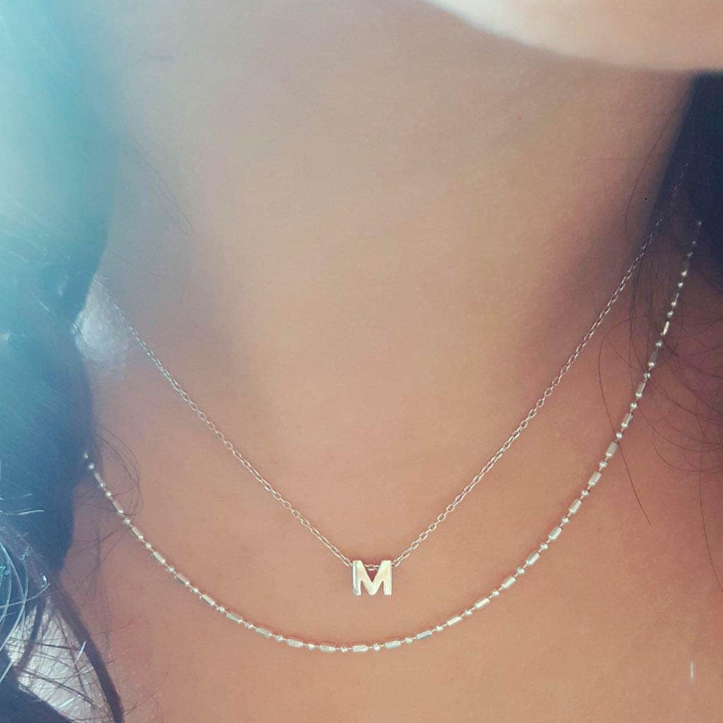 Collar letras. Tu inicial en plata siempre contigo.